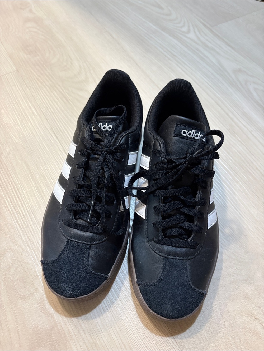 Adidas women’s black and white court-style sneakers